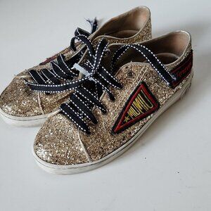 MIU MIU | Glitter Sneakers with Patches, Gold Size 35 MSRP: $650.00